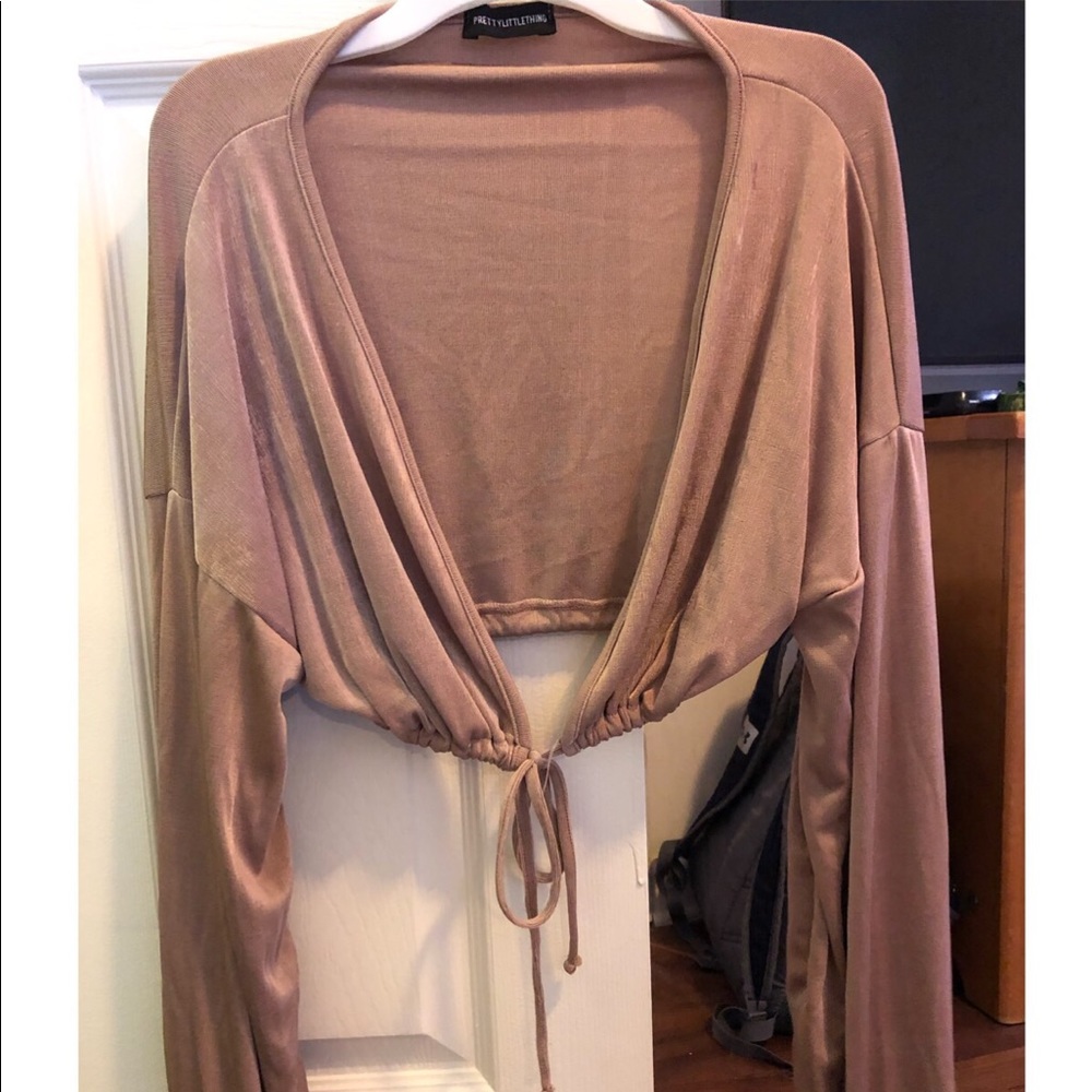 Cropped tan shirt, ties in front